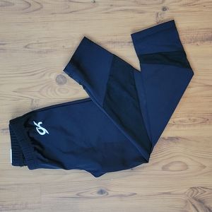 GK black Capri leggings,  mesh at the bottom of legs